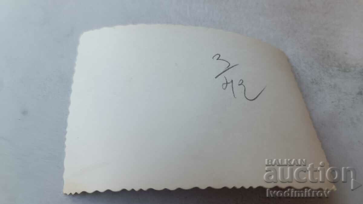 Photo Three men, a woman and children on the beach with price 1.85 BGN | € 0.95