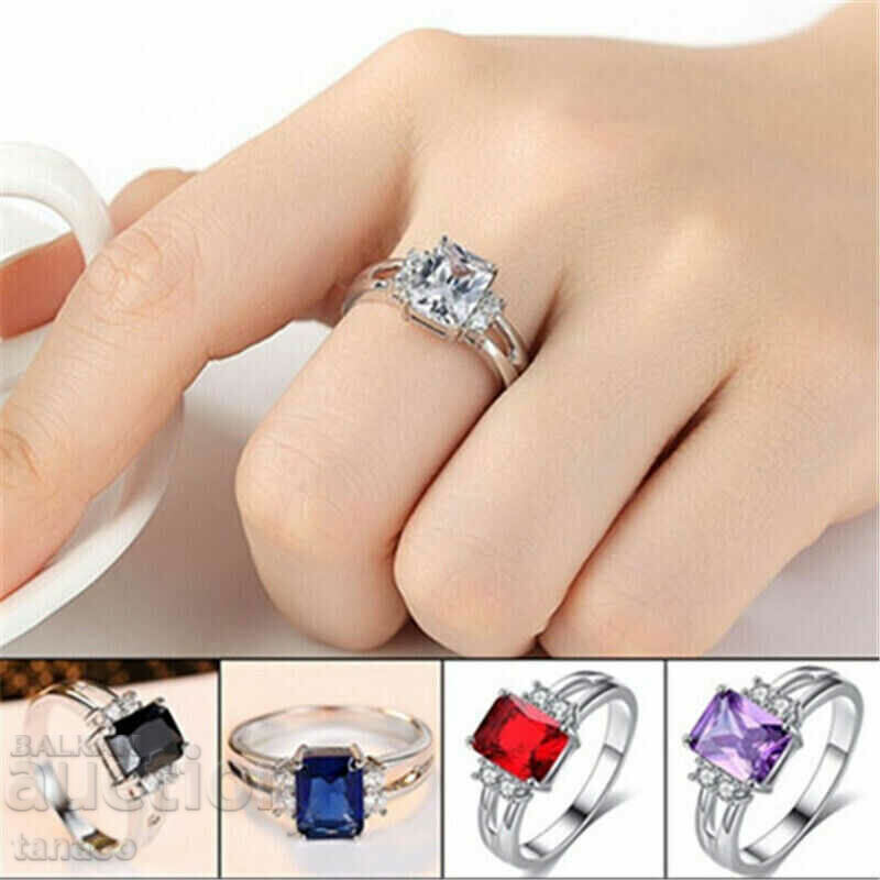 Auction Ring with white zircon, silver plated Auction Ring with white zircon, silver plated