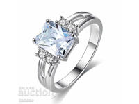 Ring with white zircon, silver plated