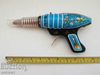 Old space gun tinplate mechanical space toy
