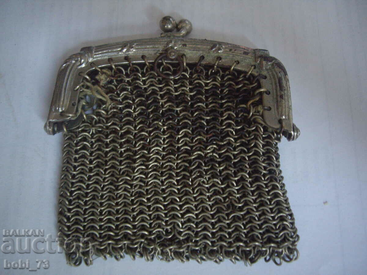 Old silver braided purse.