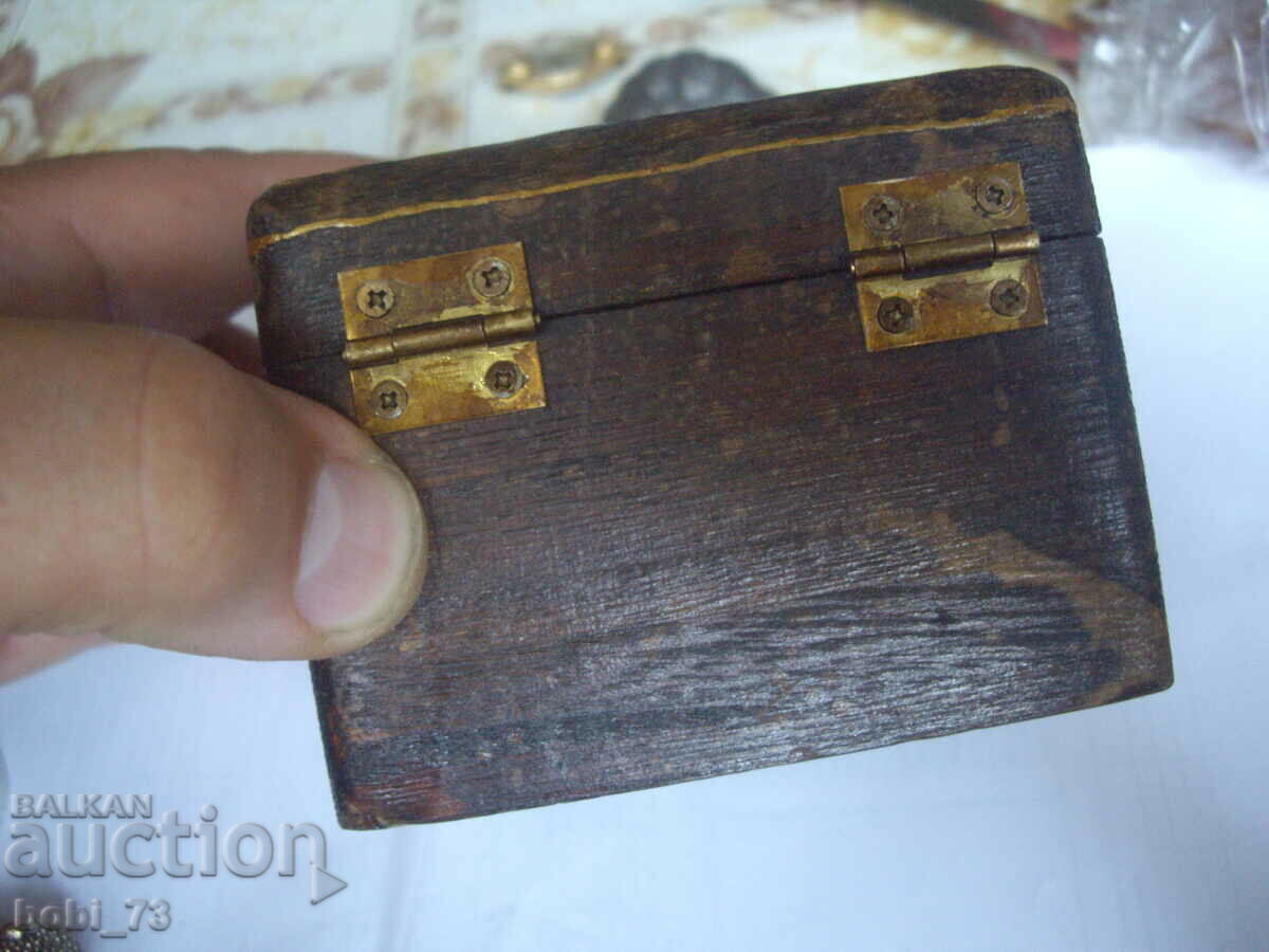 Very old wooden box with price 50.00 BGN | € 25.56 Very old wooden box with price 50.00 BGN | € 25.56