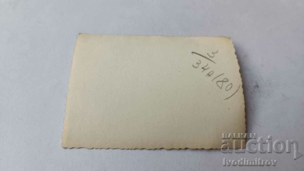 Photo Two young men and two girls on the beach with price 1.65 BGN | € 0.84 Photo Two young men and two girls on the beach with price 1.65 BGN | € 0.84