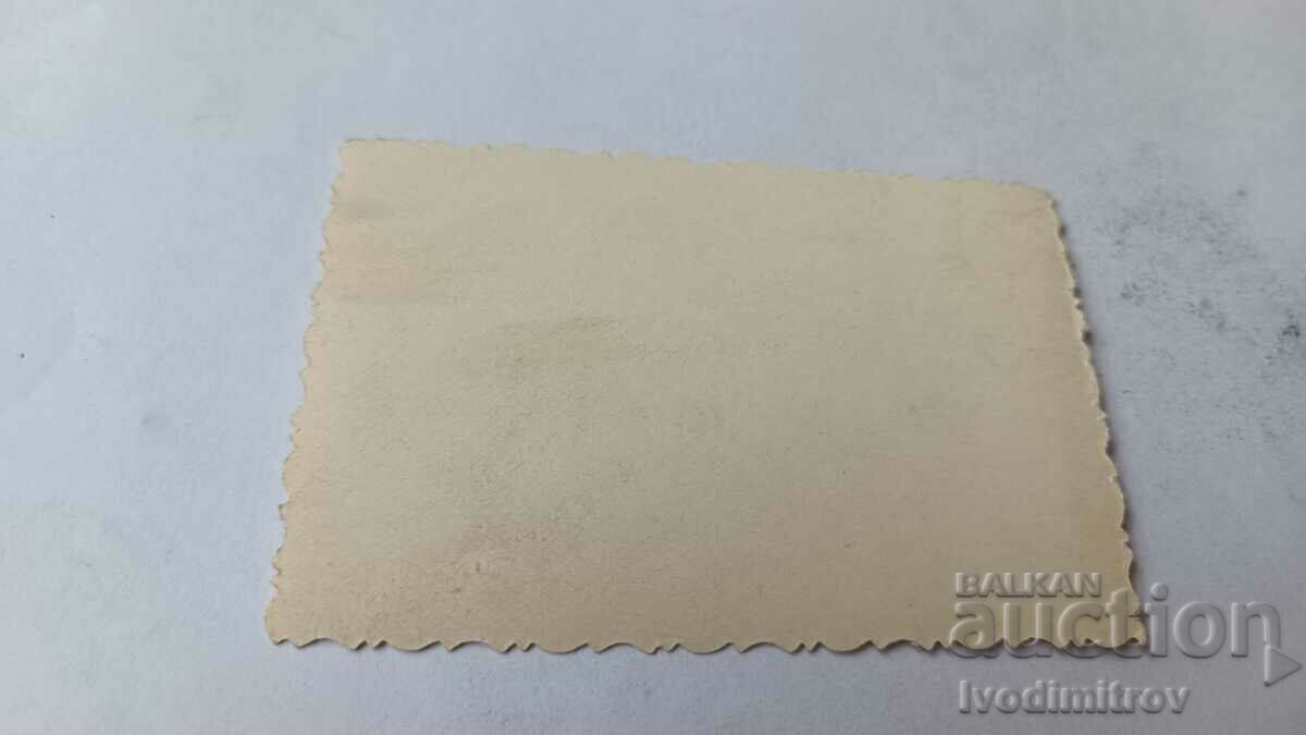 Photo Sofia A man and a woman in winter coats on the sidewalk with price 2.35 BGN | € 1.20