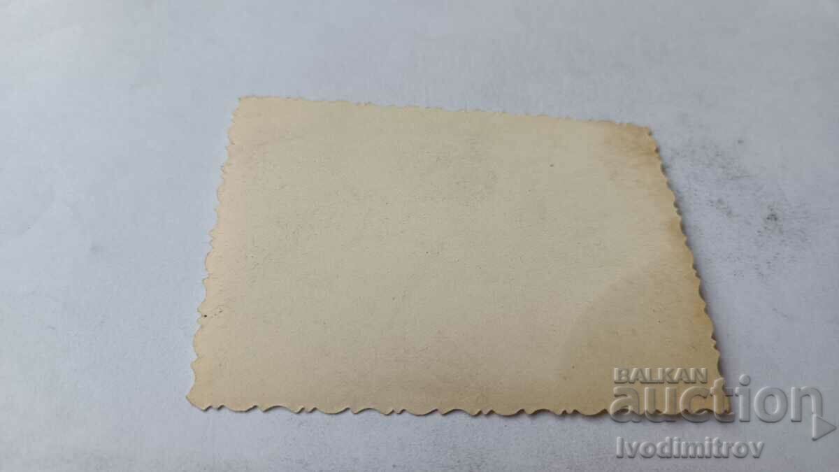 Photo Sofia A man and two women with winter coats on the sidewalk with price 2.45 BGN | € 1.25 Photo Sofia A man and two women with winter coats on the sidewalk with price 2.45 BGN | € 1.25