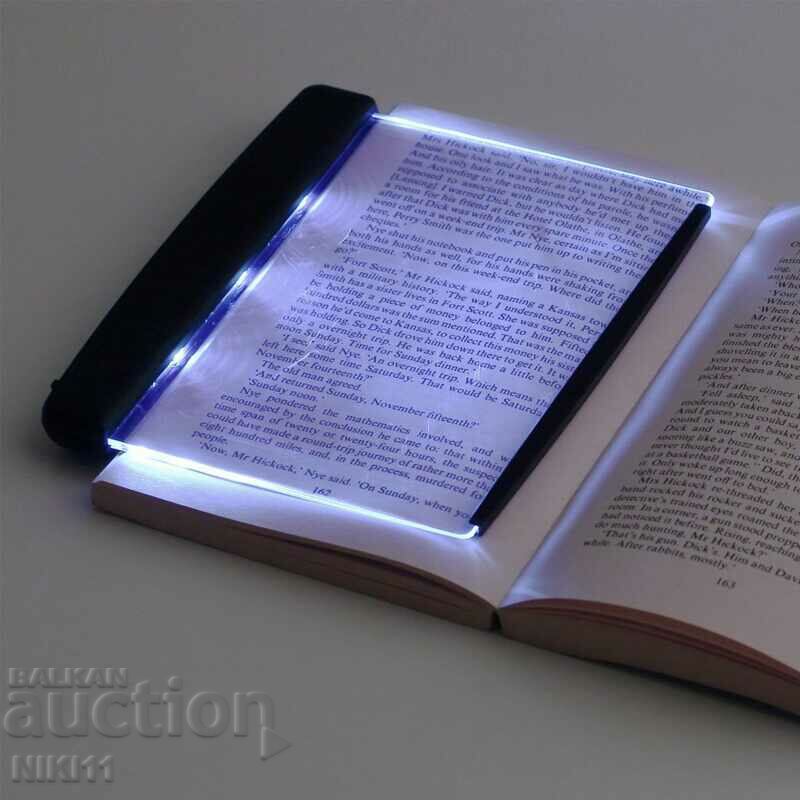 Panou LED luminos pentru citirea unei cărți în întuneric