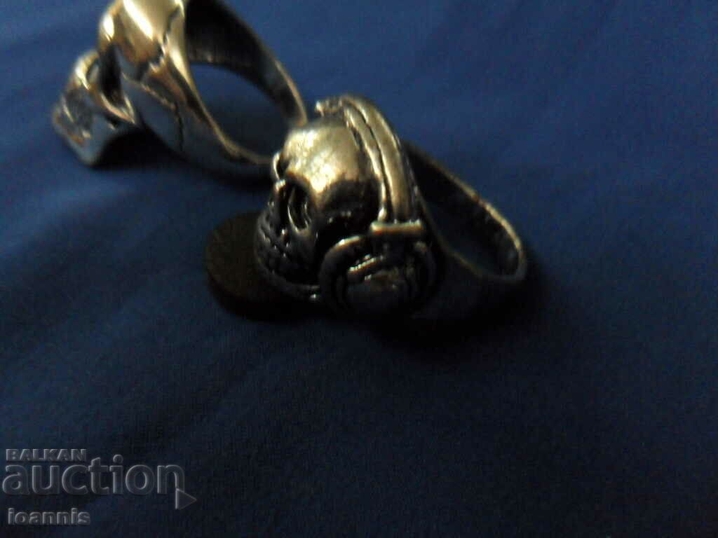 Auction Two men's rocker rings Auction Two men's rocker rings