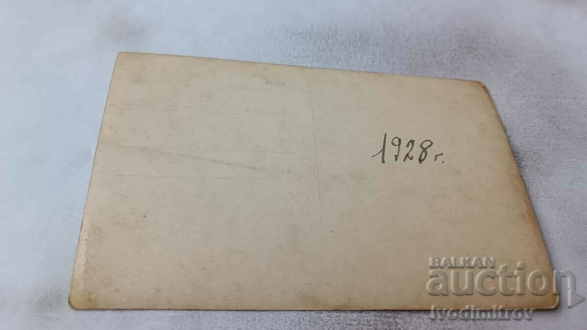 Photo Woman in a white dress with an umbrella on a rock by the sea 1928 with price 2.15 BGN | € 1.10 Photo Woman in a white dress with an umbrella on a rock by the sea 1928 with price 2.15 BGN | € 1.10