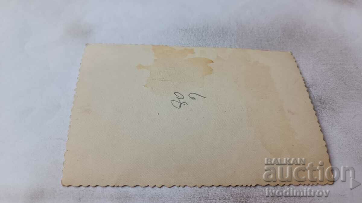 Photo A young man and a young girl in folk costumes with price 2.35 BGN | € 1.20