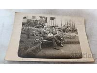 Photo Man woman and girl on a park bench 1931