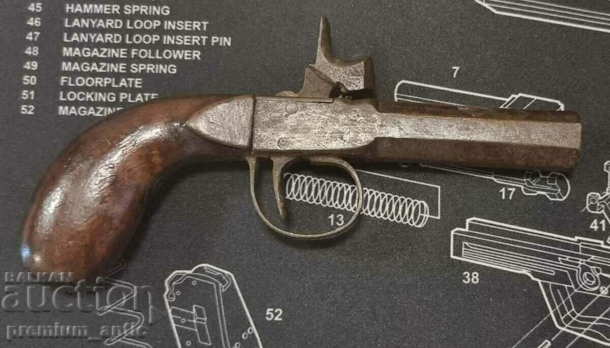 pistol capsulă calibrul 11 mm