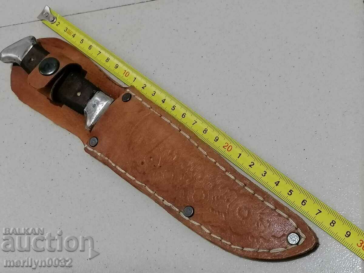 Delivery of An old tourist knife with a dagger blade Delivery of An old tourist knife with a dagger blade