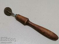 An old leather cutting tool