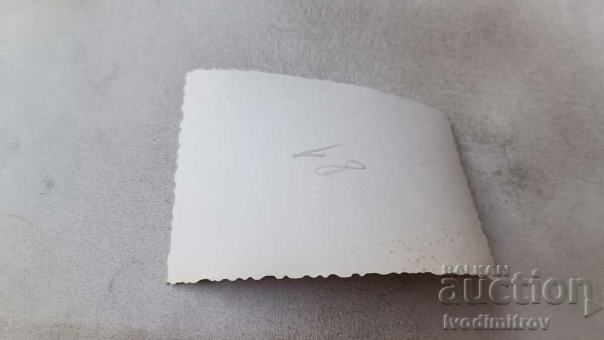 Photo A young man and two young girls in the park with price 0.75 BGN | € 0.38