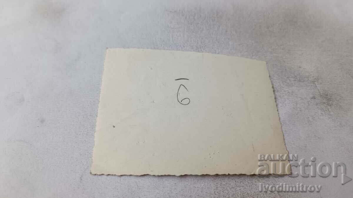 Photo A young man and a woman with chickens in the yard with price 1.35 BGN | € 0.69 Photo A young man and a woman with chickens in the yard with price 1.35 BGN | € 0.69