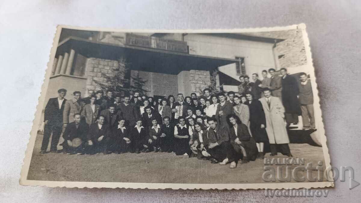 Photo Men and women in front of the State Textile Combine
