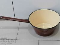 Old enamel pot, pan with enamel household pot