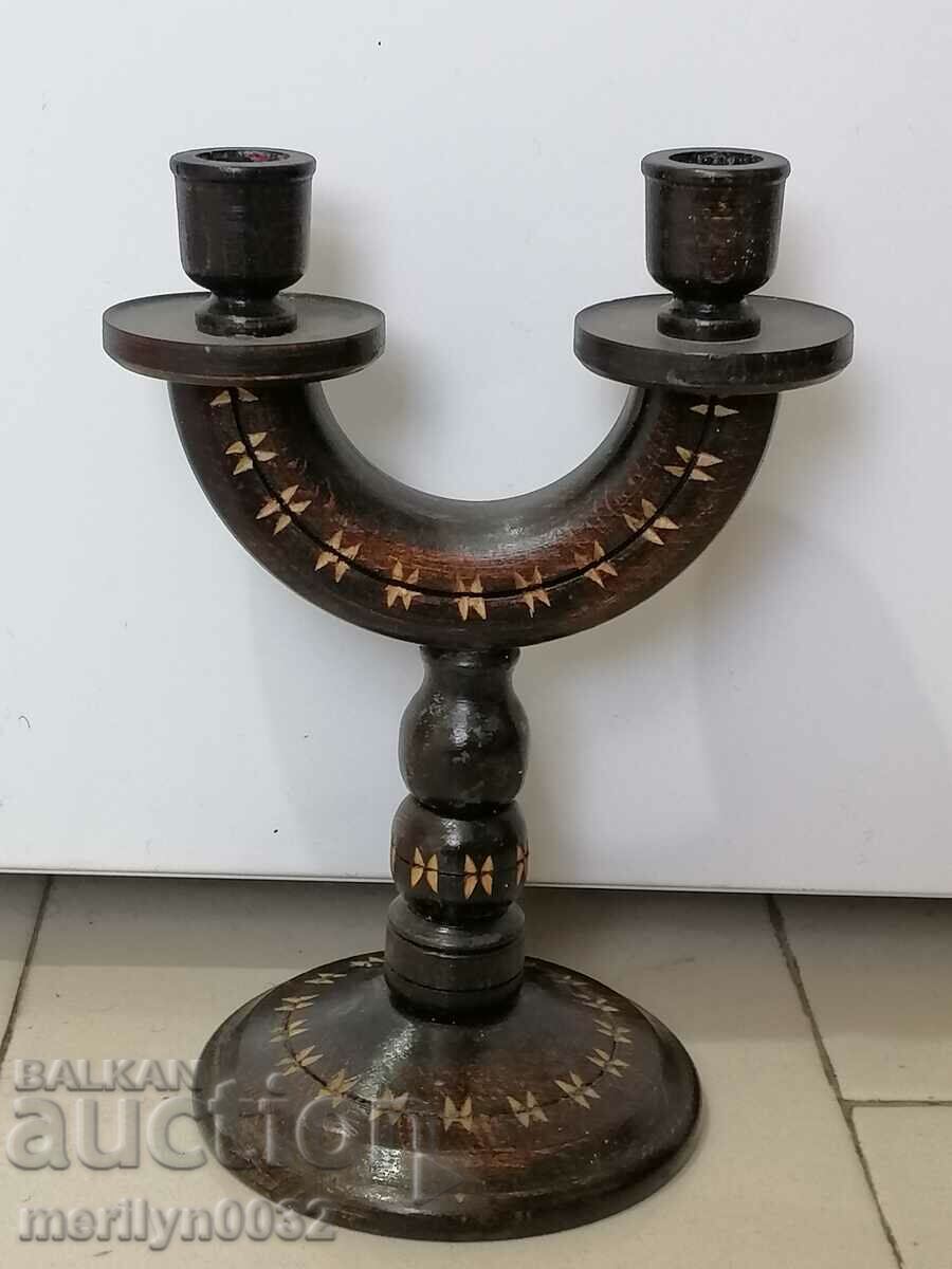 Old candlestick made of lamp wood