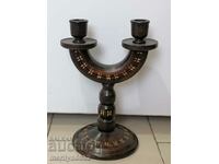 Old candlestick made of lamp wood
