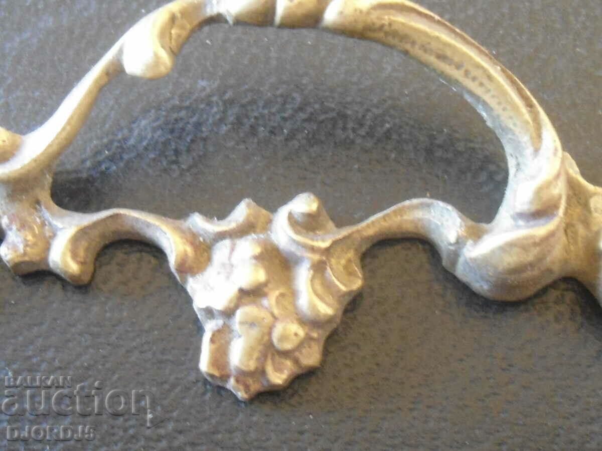 Old bronze handle with price 15.00 BGN | € 7.67 Old bronze handle with price 15.00 BGN | € 7.67