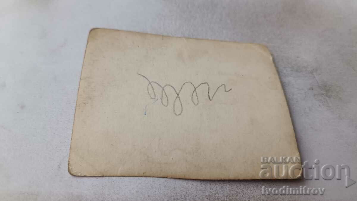 Photo Men women and children eating watermelon in the yard of their house with price 1.65 BGN | € 0.84