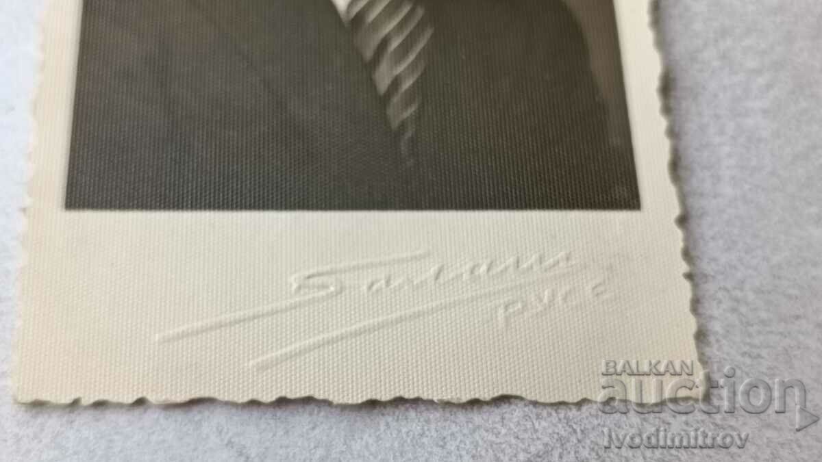 Photo of a man in a suit with price 5.65 BGN | € 2.89 Photo of a man in a suit with price 5.65 BGN | € 2.89