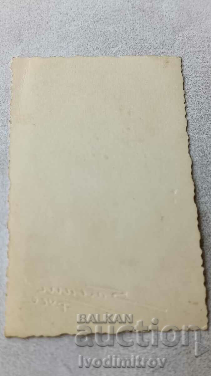 Auction Photo of a man in a suit Auction Photo of a man in a suit