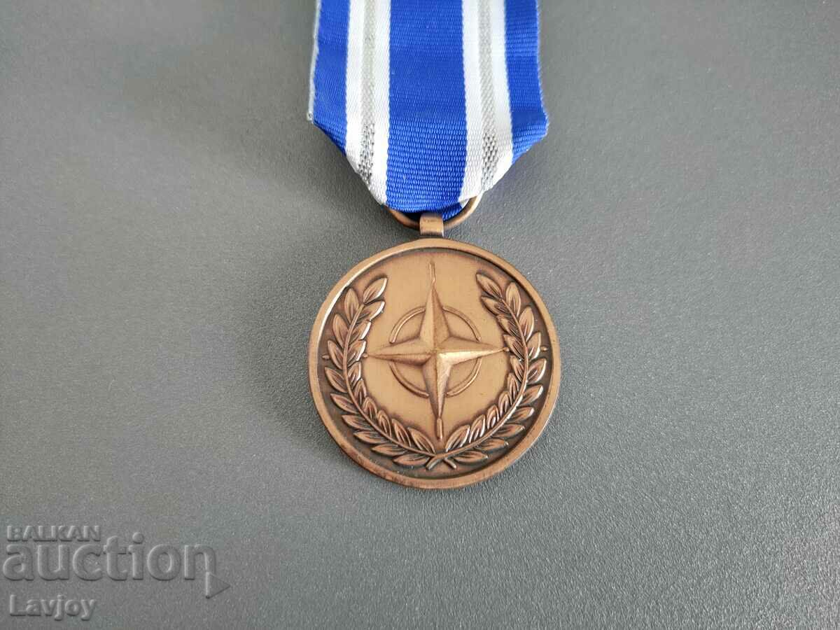 NATO military medal with carrier with price 30.00 BGN | € 15.34 NATO military medal with carrier with price 30.00 BGN | € 15.34