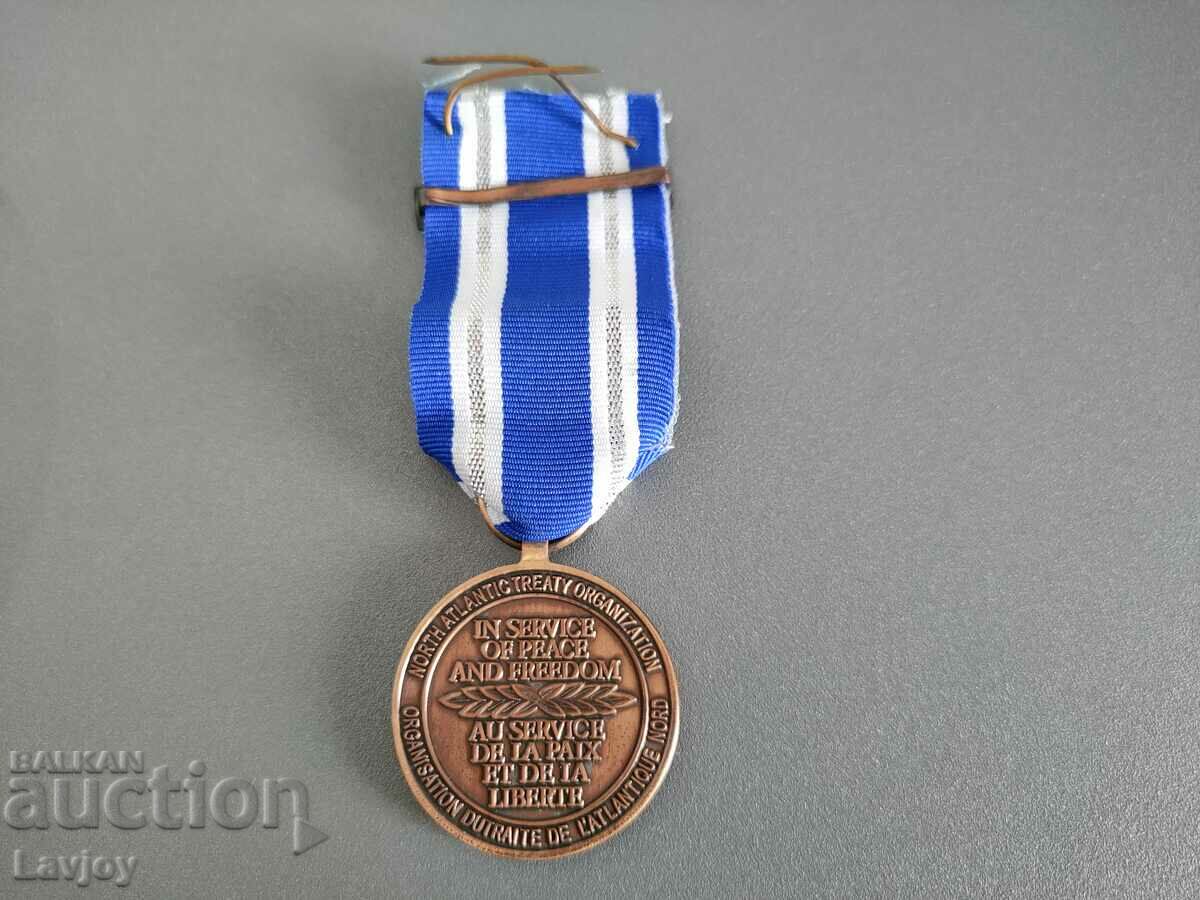 Auction NATO military medal with carrier Auction NATO military medal with carrier