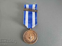 NATO military medal with carrier