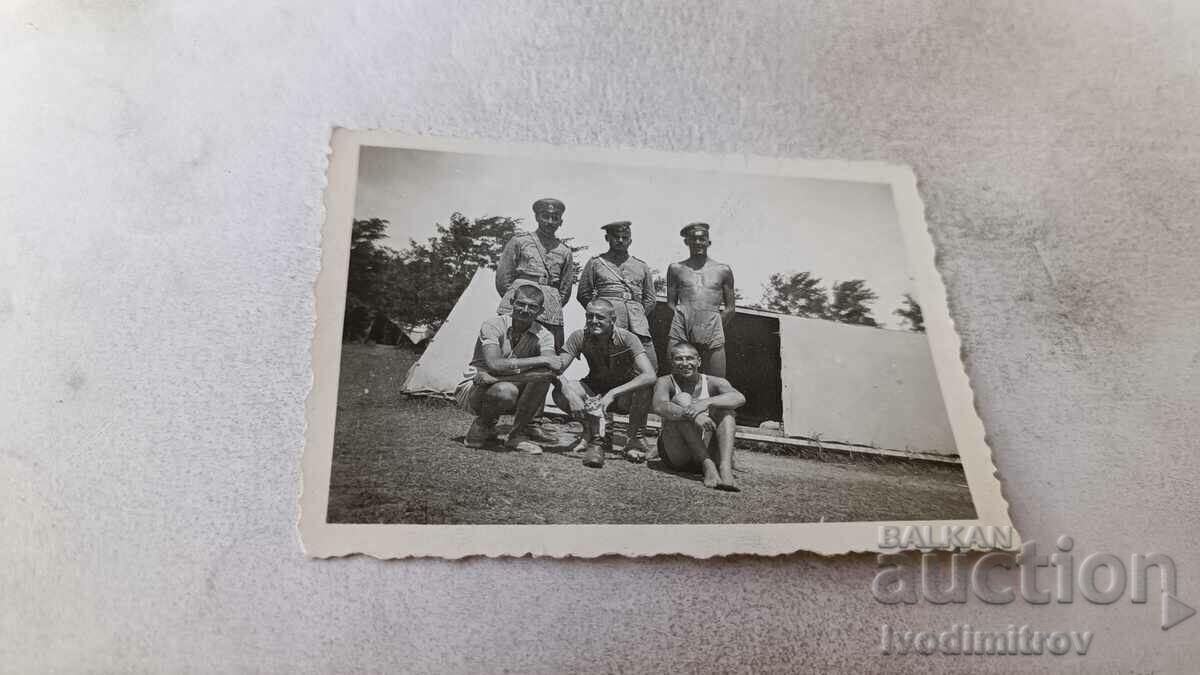 Photo Officers and soldiers in front of a tent
