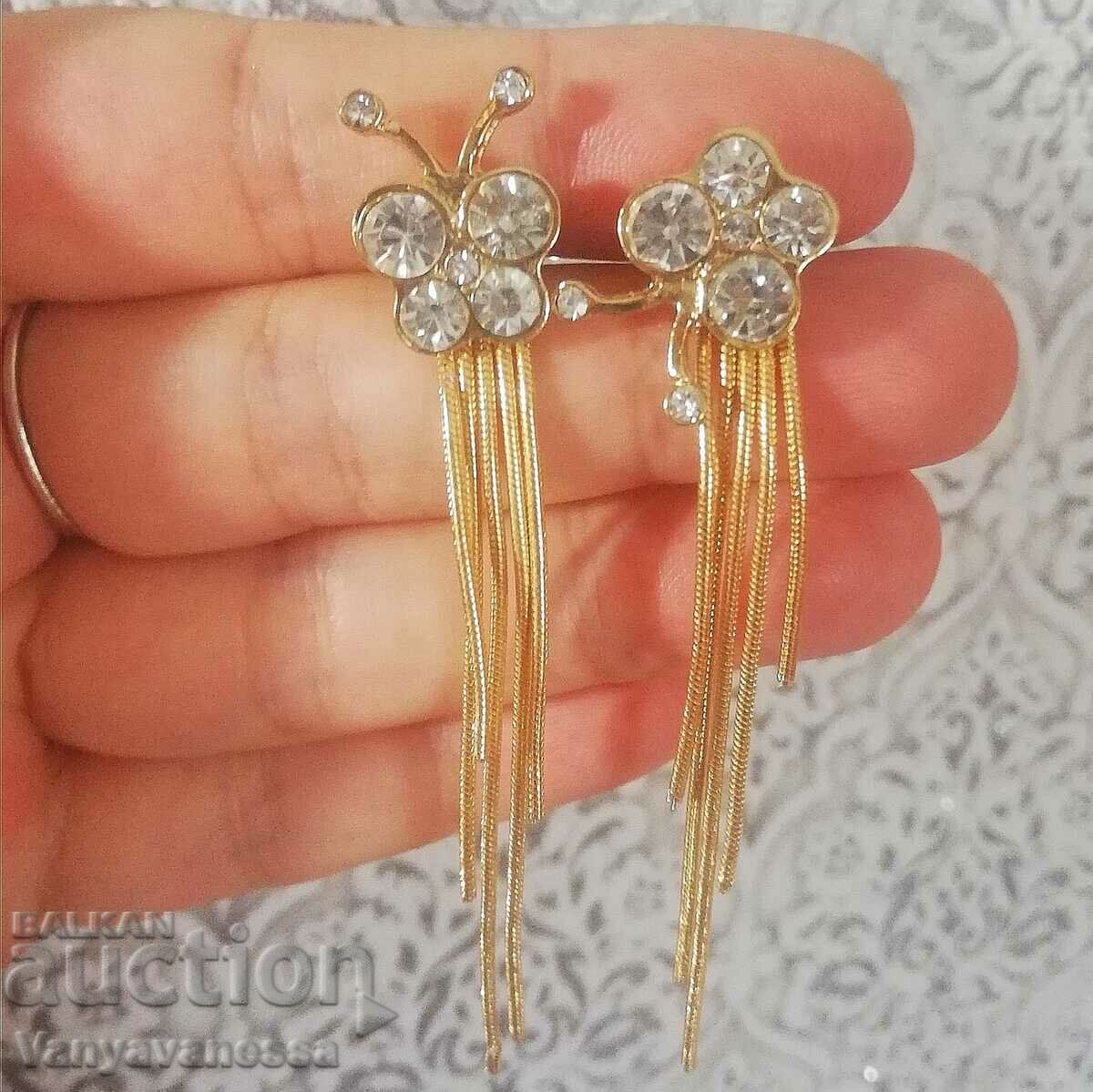 Butterfly dangle earrings with white crystals on a screw