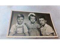 Photo Sofia Girl with ribbon and two boys 1957