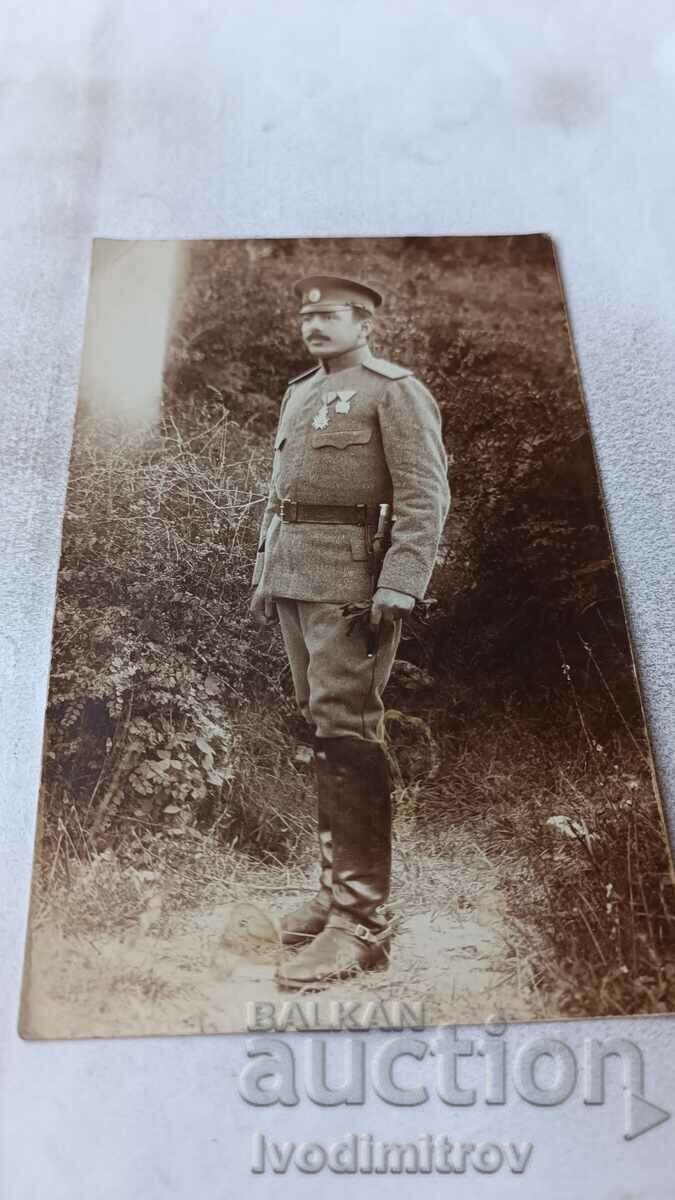 Photo Officer with order and medal for meritorious service on the PSV front