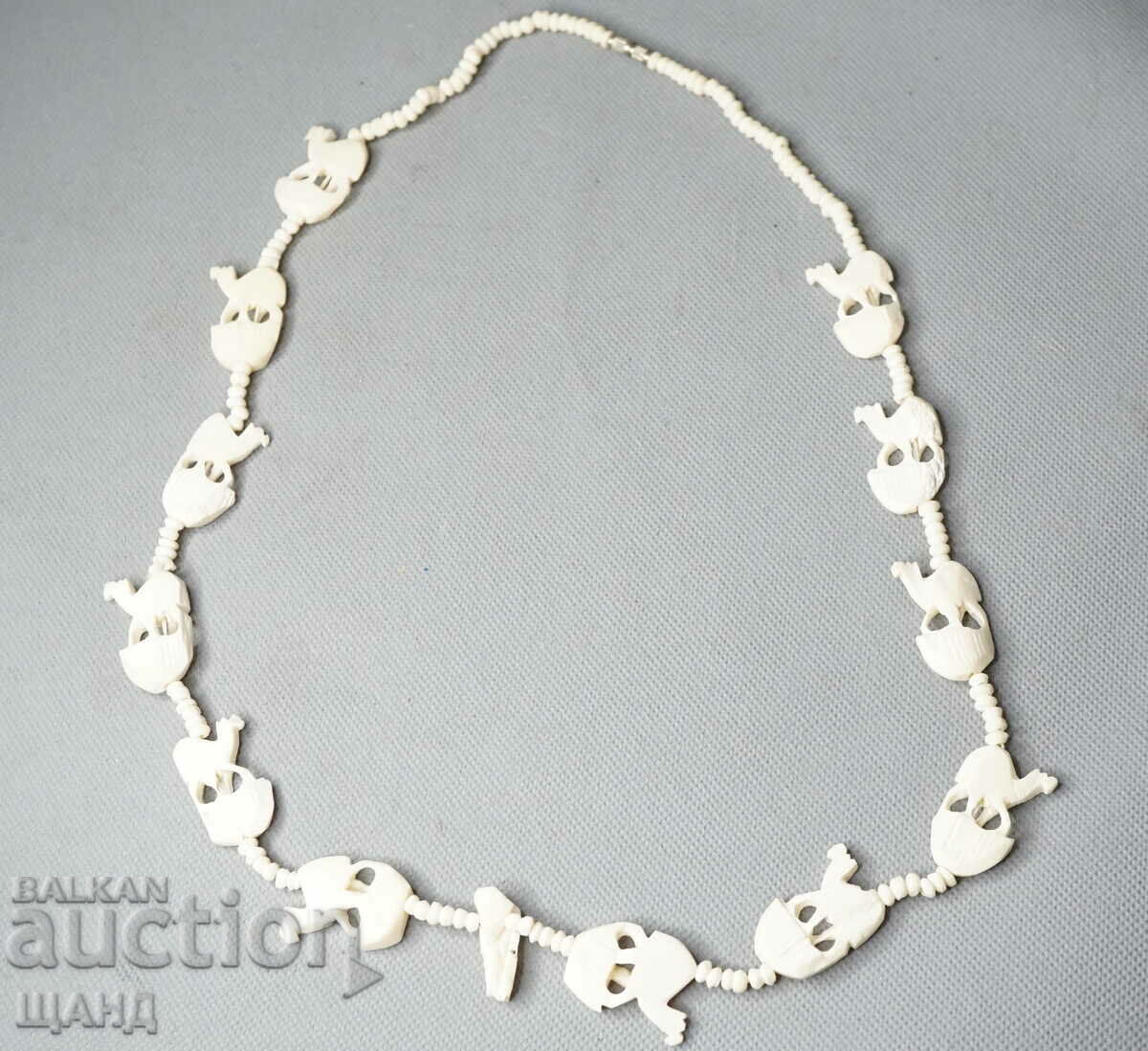 Auction  Beautiful African Necklace made of bone jewel camels