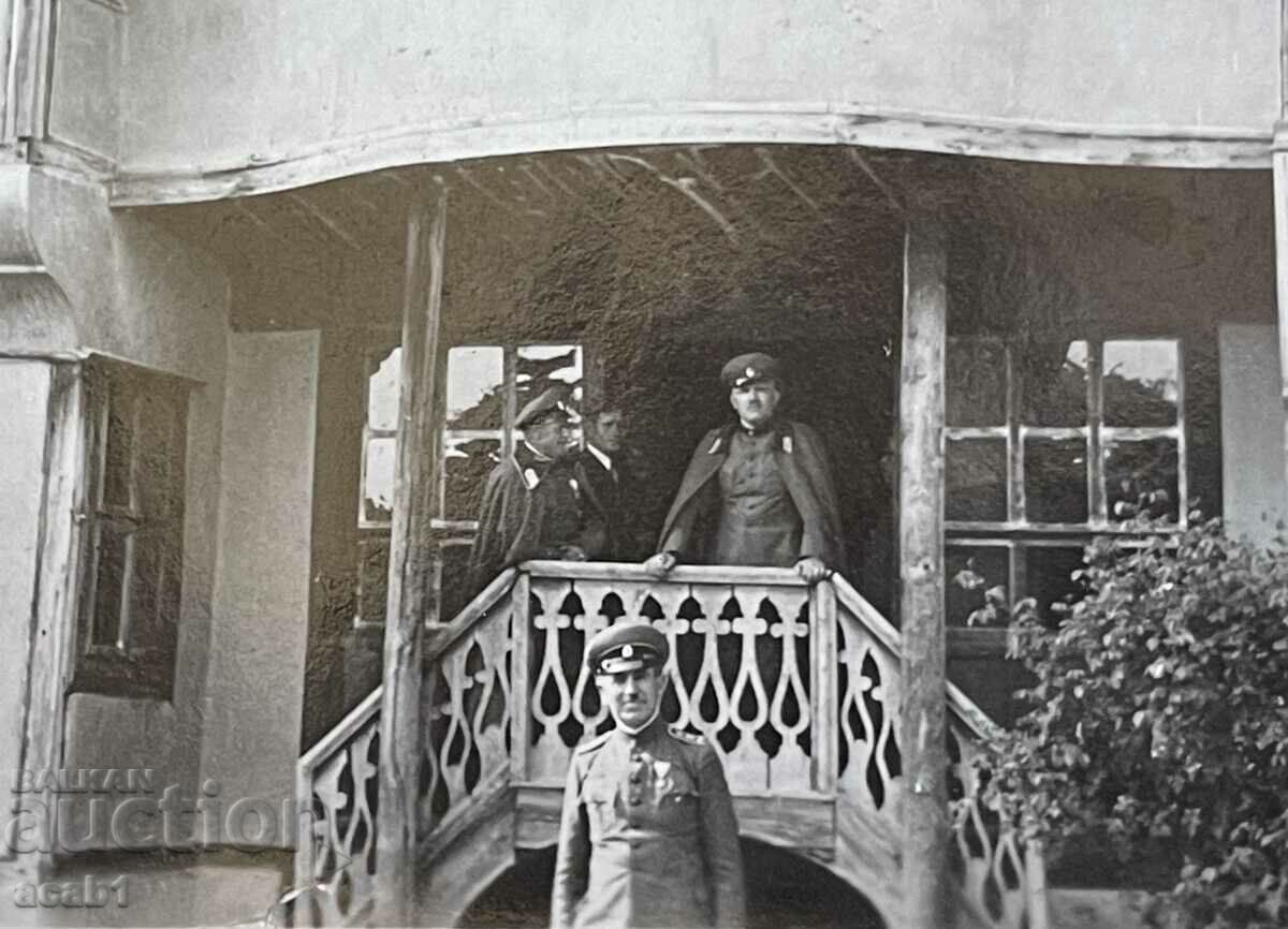 Military in front of a revival house