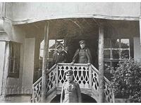 Military in front of a revival house