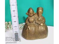 A rare vintage pair of collectible brass bells