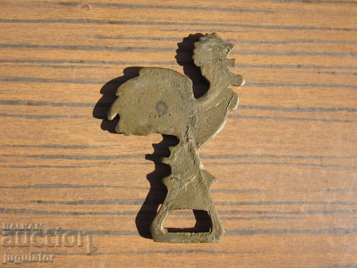 Delivery of collectible antique bronze cockerel bird opener