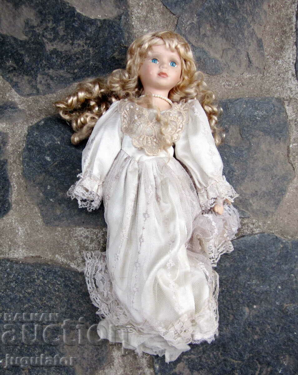 old porcelain doll with glass eyes marked