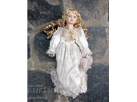 old porcelain doll with glass eyes marked