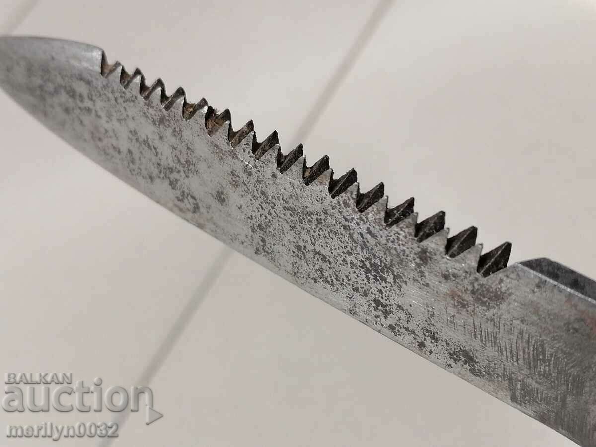 Auction Old WW2 horned serrated knife and saw blade Auction Old WW2 horned serrated knife and saw blade