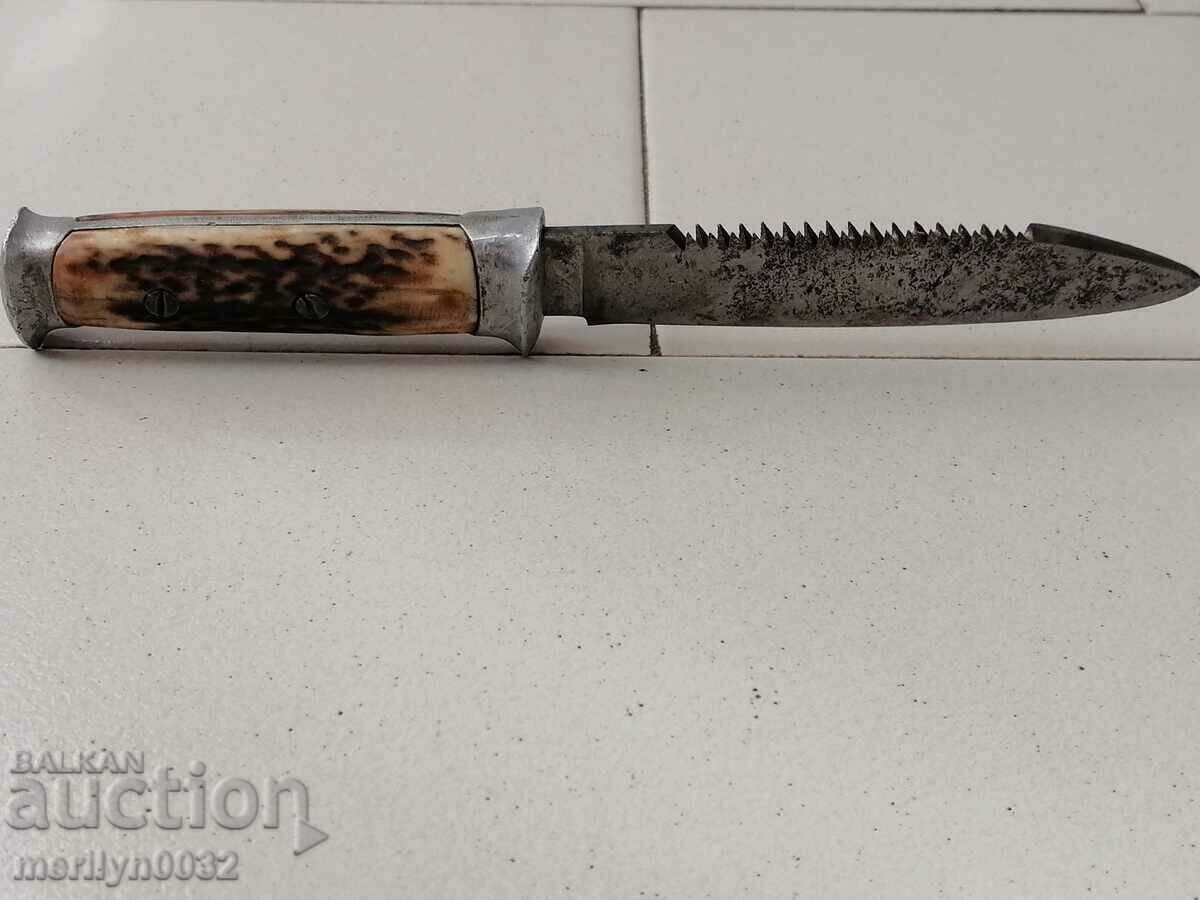 Delivery of Old WW2 horned serrated knife and saw blade Delivery of Old WW2 horned serrated knife and saw blade