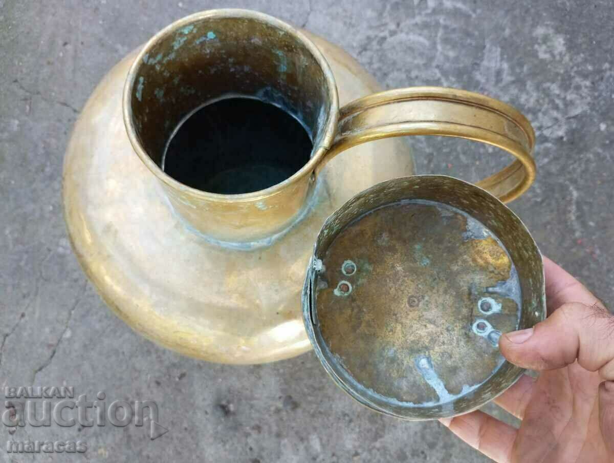 Delivery of Old brass vessel, jug type Delivery of Old brass vessel, jug type