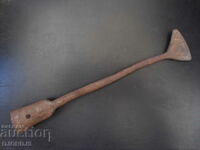 An old forged tool, a scabbard