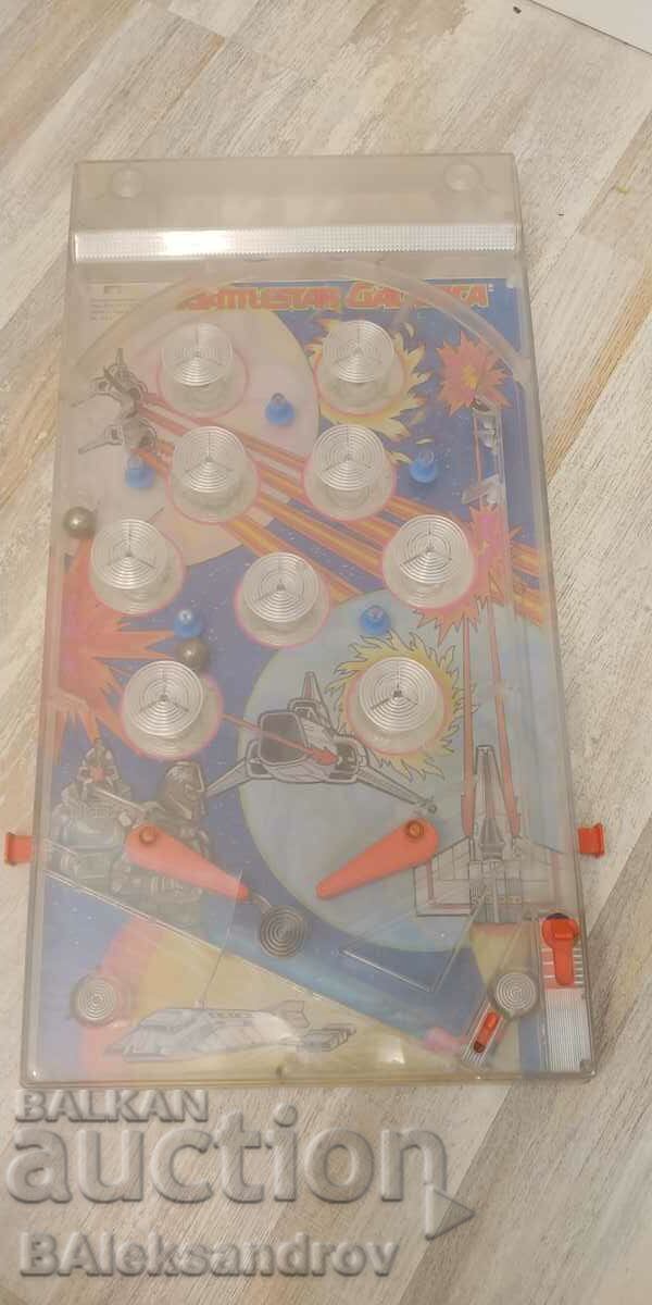 Old pinball machine, raider