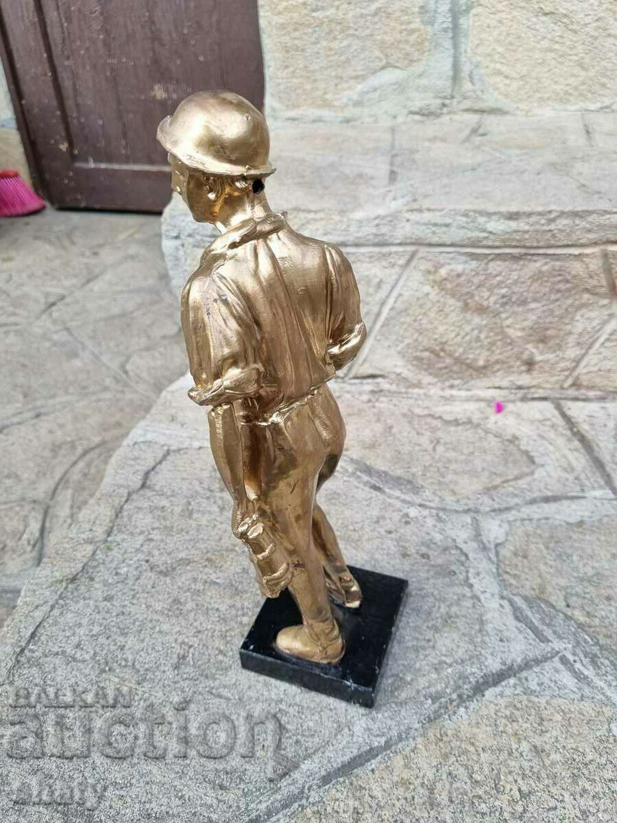 Old metal sculpture. Figure - 5