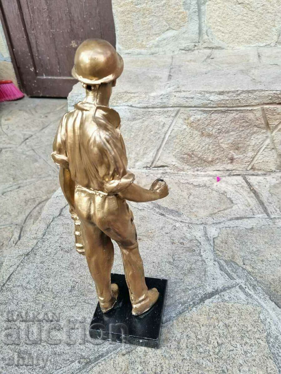 Old metal sculpture. Figure - 6