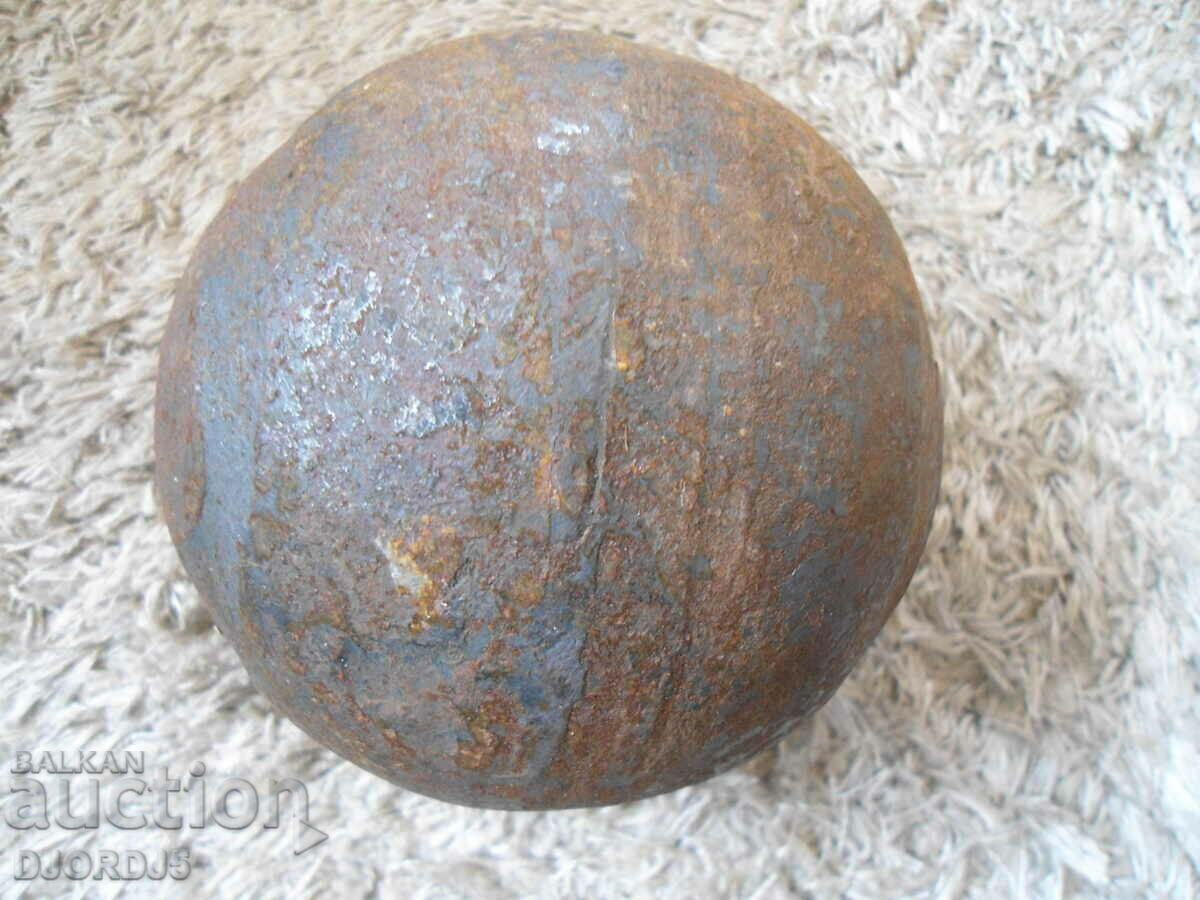 Auction  Old cannonball, about 8 kg.