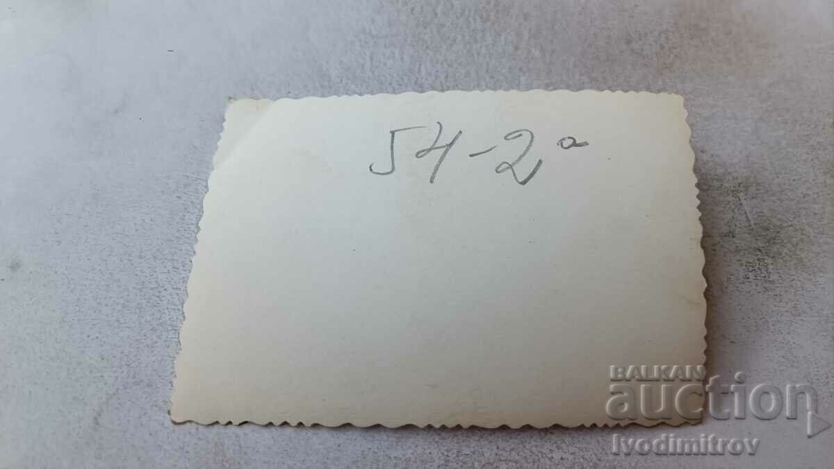 Photo Sofia Dmama men and a young woman on the sidewalk with price 2.35 BGN | € 1.20 Photo Sofia Dmama men and a young woman on the sidewalk with price 2.35 BGN | € 1.20